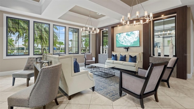 living room featuring a raised ceiling, light tile patterned floors, crown molding, and a chandelier