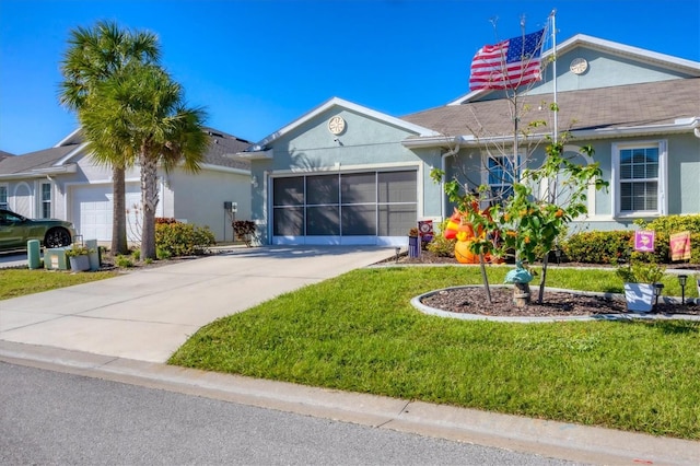 single story home with a front yard and a garage