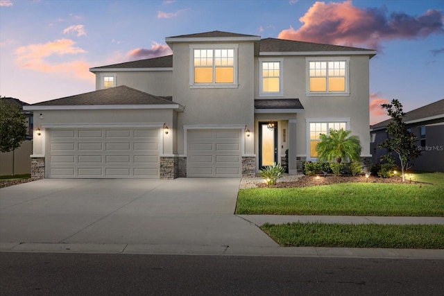 view of front of property with a lawn