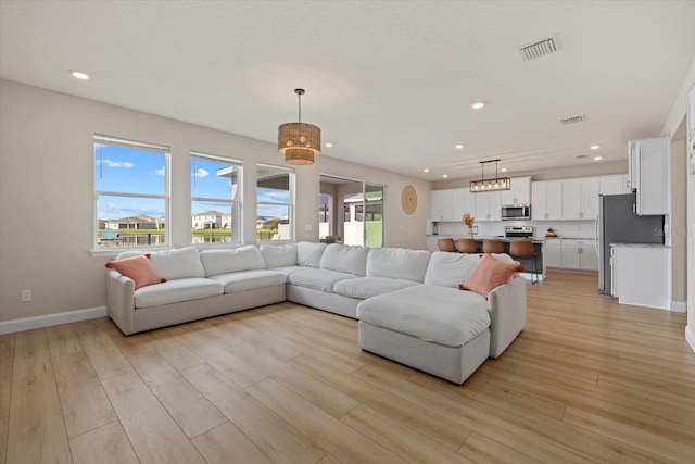 living room with light wood-type flooring