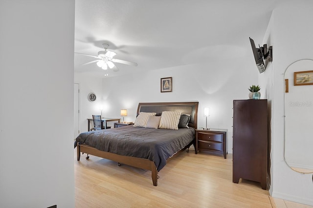 208 Lewis Cir Unit 4A, Punta Gorda, FL 33950 - bedroom with light wood-style flooring, baseboards, and a ceiling fan