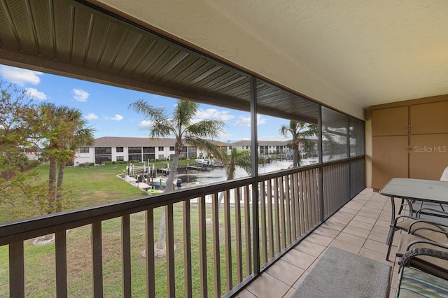 balcony featuring a water view