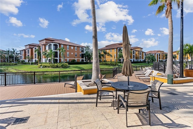 8377 38th Street Cir E Unit 308, Sarasota, FL 34243 - view of patio featuring a water view