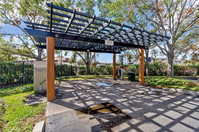 8377 38th Street Cir E Unit 308, Sarasota, FL 34243 - view of patio / terrace with a pergola
