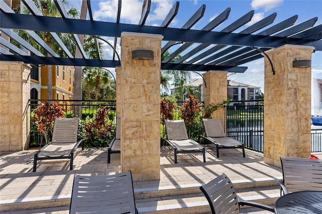 8377 38th Street Cir E Unit 308, Sarasota, FL 34243 - view of patio with a pergola
