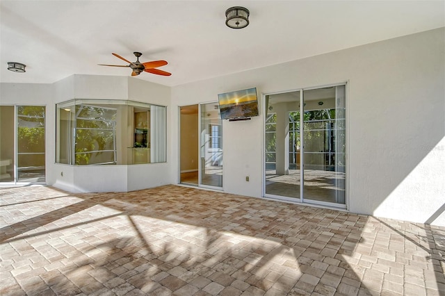 view of patio / terrace with ceiling fan