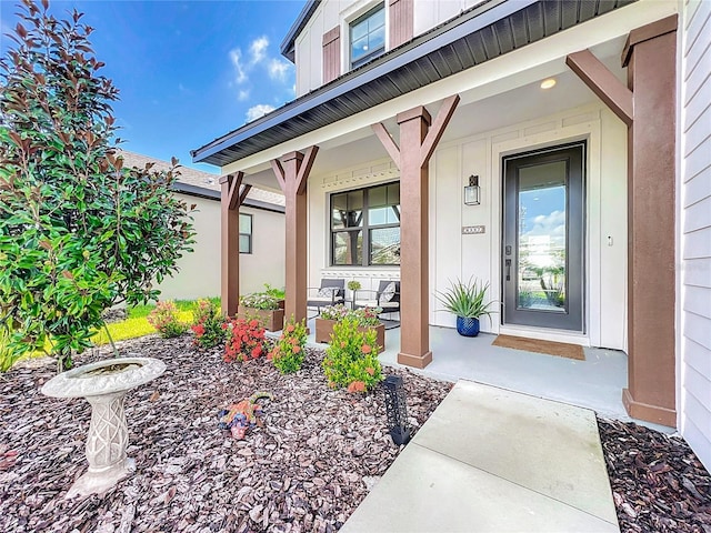 entrance to property with a porch