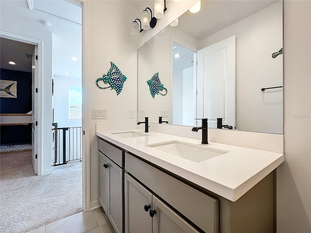 bathroom featuring vanity and tile patterned flooring