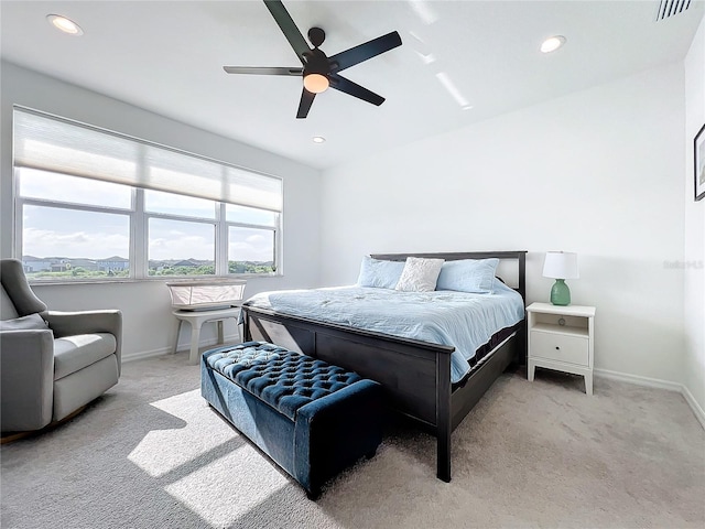 carpeted bedroom with ceiling fan