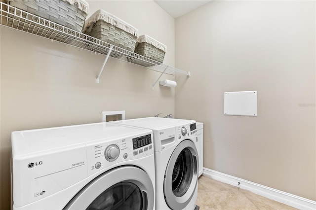 laundry area featuring separate washer and dryer