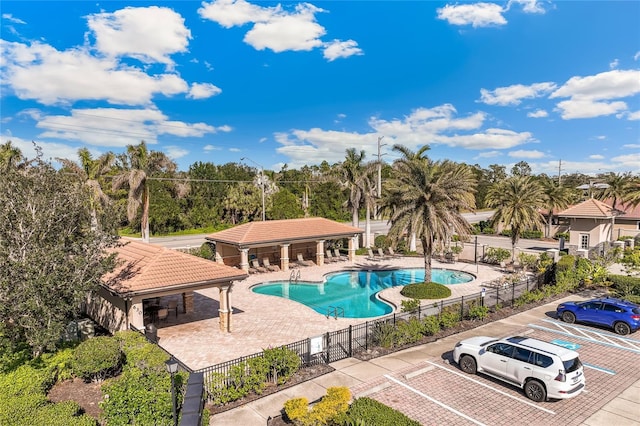 view of pool featuring a patio