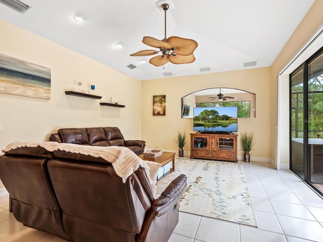 tiled living room featuring lofted ceiling