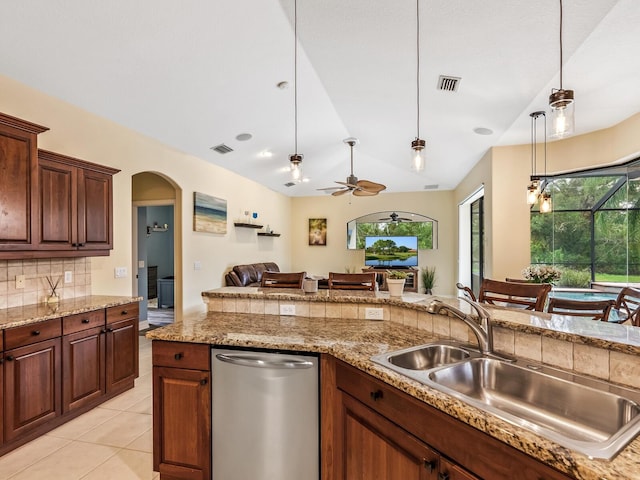 kitchen with ceiling fan, dishwasher, sink, tasteful backsplash, and decorative light fixtures