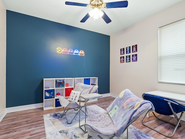 bedroom with hardwood / wood-style flooring and ceiling fan