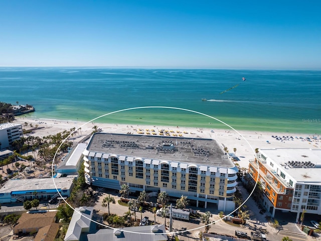 bird's eye view featuring a beach view and a water view