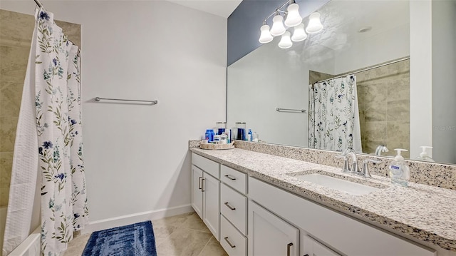 bathroom with shower / bath combination with curtain, vanity, tile patterned floors, and a notable chandelier