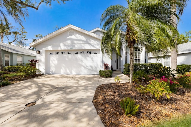 ranch-style home featuring a garage