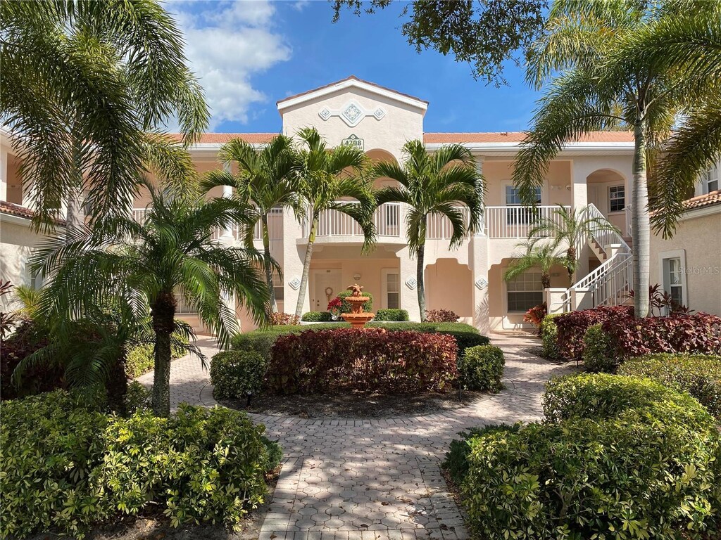 4208 Central Sarasota Pkwy Unit 1417, Sarasota, FL 34238 - view of building exterior with stairway