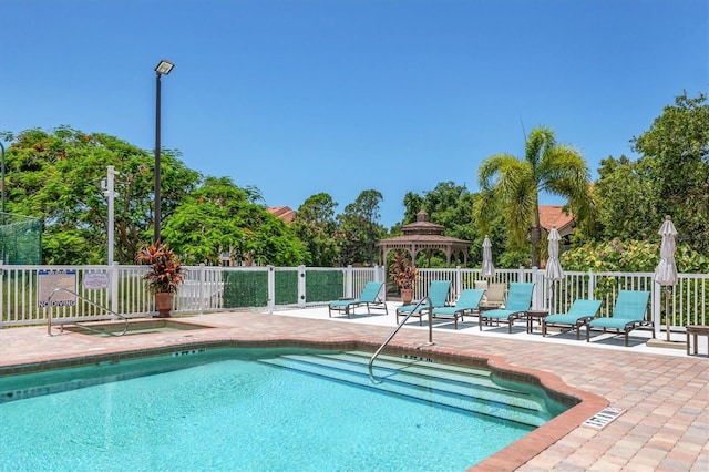 view of pool with a gazebo and a patio area