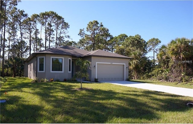 view of front of home with a garage and a front lawn