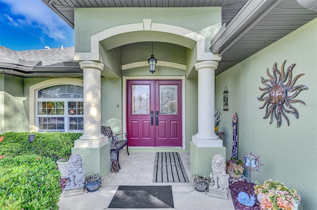 entrance to property featuring covered porch