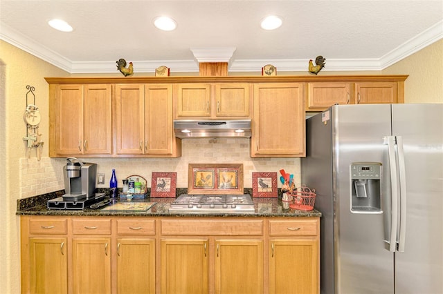 kitchen featuring dark stone countertops, decorative backsplash, ornamental molding, and appliances with stainless steel finishes