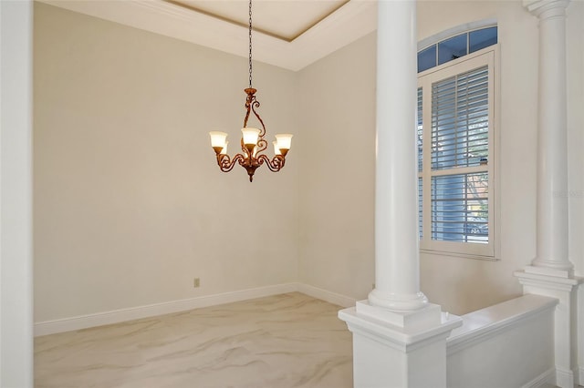 empty room with a notable chandelier