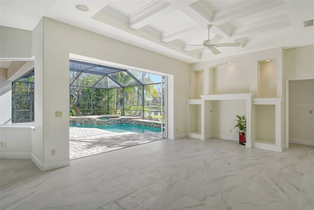 unfurnished living room with ceiling fan, beamed ceiling, coffered ceiling, and ornamental molding