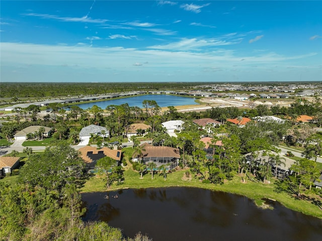 drone / aerial view with a water view