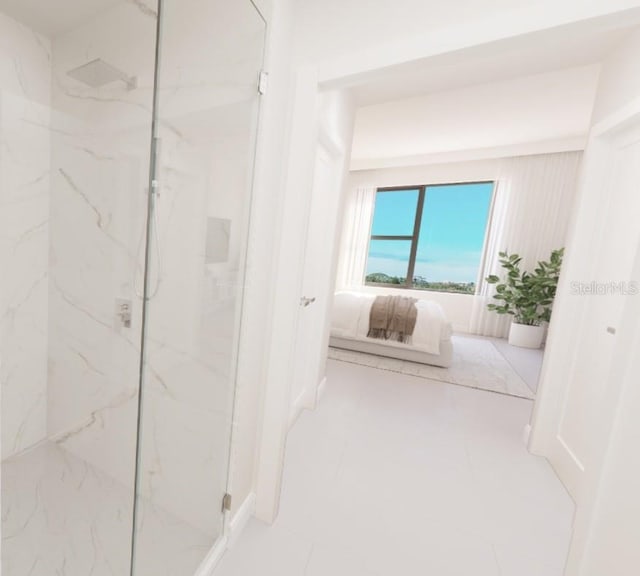 bathroom featuring tiled shower