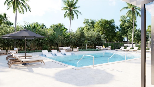 view of swimming pool featuring a patio area