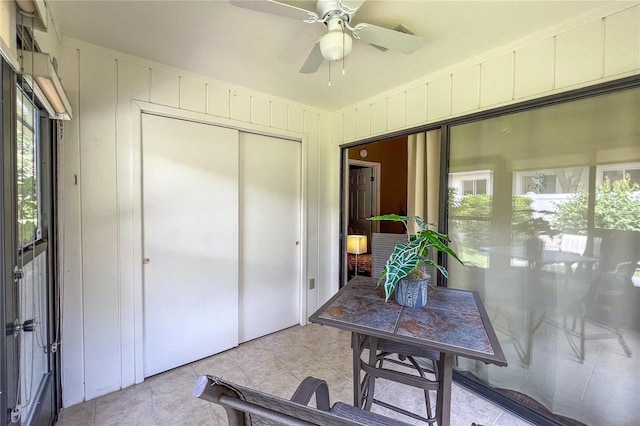 interior space featuring ceiling fan