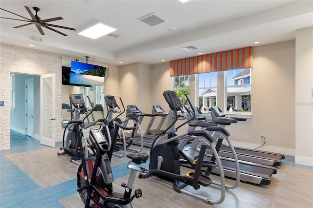 workout area with ceiling fan