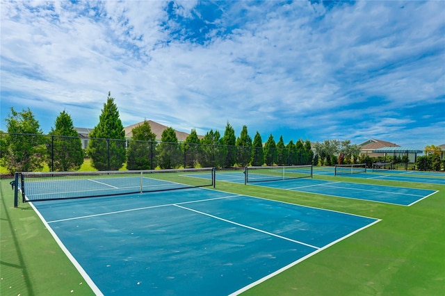 view of sport court featuring basketball hoop