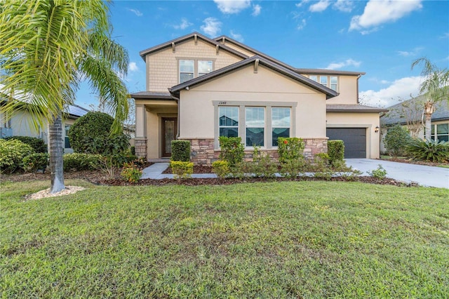 13148 Bliss Loop, Bradenton, FL 34211 - craftsman-style home featuring stucco siding, stone siding, concrete driveway, and a front yard