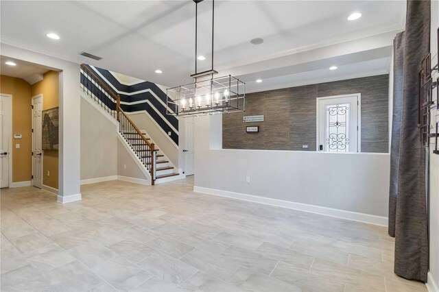 13148 Bliss Loop, Bradenton, FL 34211 - unfurnished living room featuring stairway, a chandelier, ornamental molding, recessed lighting, and baseboards