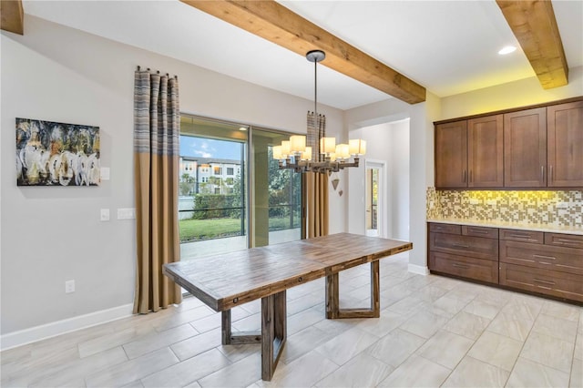 dining room with beamed ceiling and a chandelier