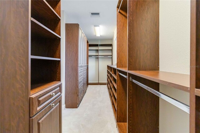 13148 Bliss Loop, Bradenton, FL 34211 - walk in closet featuring light colored carpet