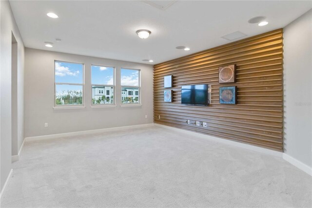 13148 Bliss Loop, Bradenton, FL 34211 - unfurnished living room featuring carpet floors, baseboards, and recessed lighting