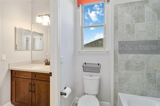 13148 Bliss Loop, Bradenton, FL 34211 - bathroom with vanity, toilet, baseboards, and shower / bath combination