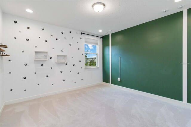 13148 Bliss Loop, Bradenton, FL 34211 - empty room with light colored carpet, baseboards, and recessed lighting