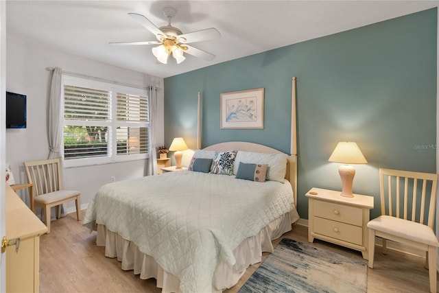 bedroom featuring ceiling fan and light hardwood / wood-style flooring