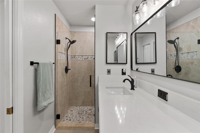 bathroom featuring vanity and walk in shower