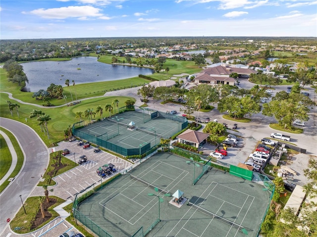 drone / aerial view with a water view