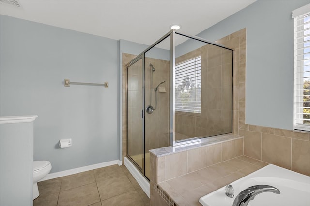 full bathroom with tile patterned flooring, separate shower and tub, toilet, and sink