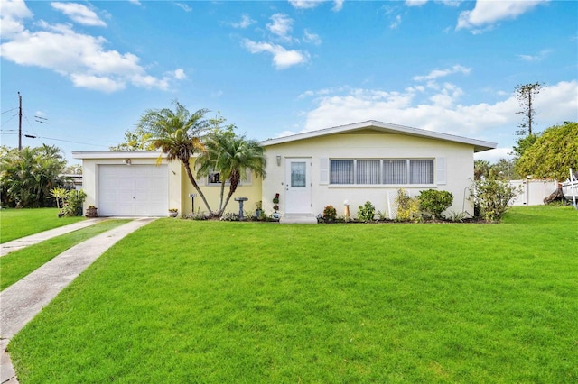 ranch-style home with a front yard and a garage