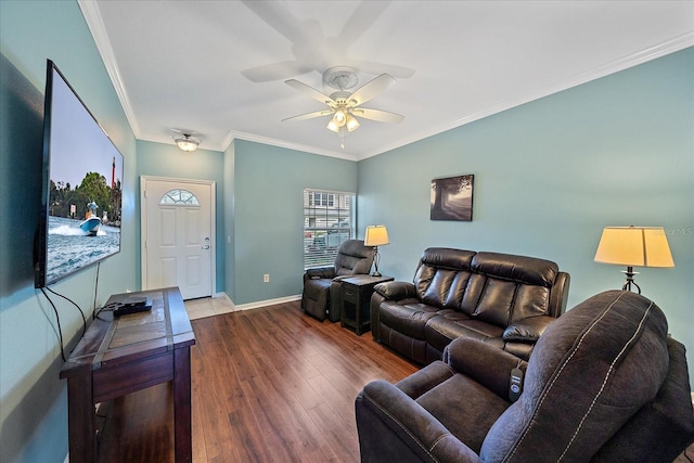 living room with hardwood / wood-style floors, ceiling fan, and ornamental molding