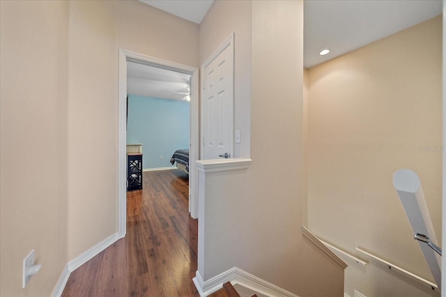 hall with dark hardwood / wood-style floors