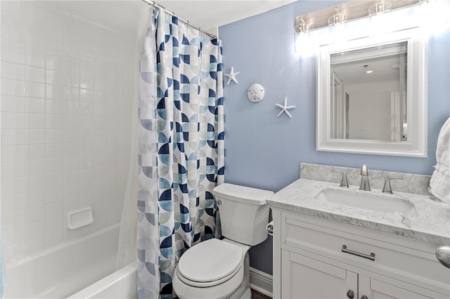 full bathroom featuring shower / tub combo with curtain, vanity, and toilet