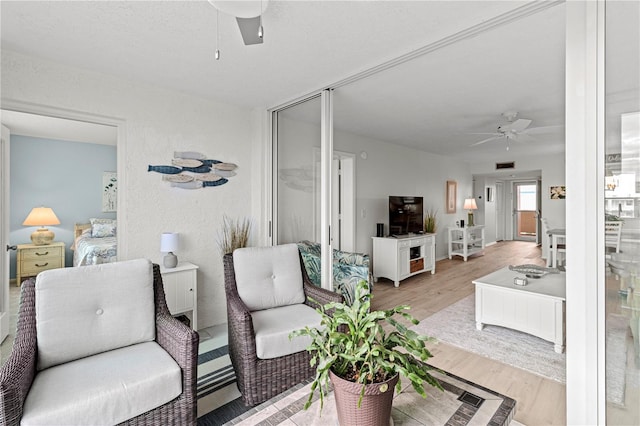 living room with light hardwood / wood-style flooring